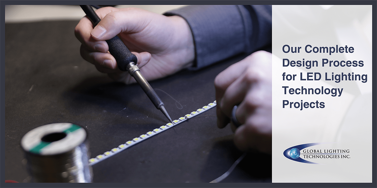 A pair of hands holds a soldering tool to manipulate a piece of metal sitting on a table