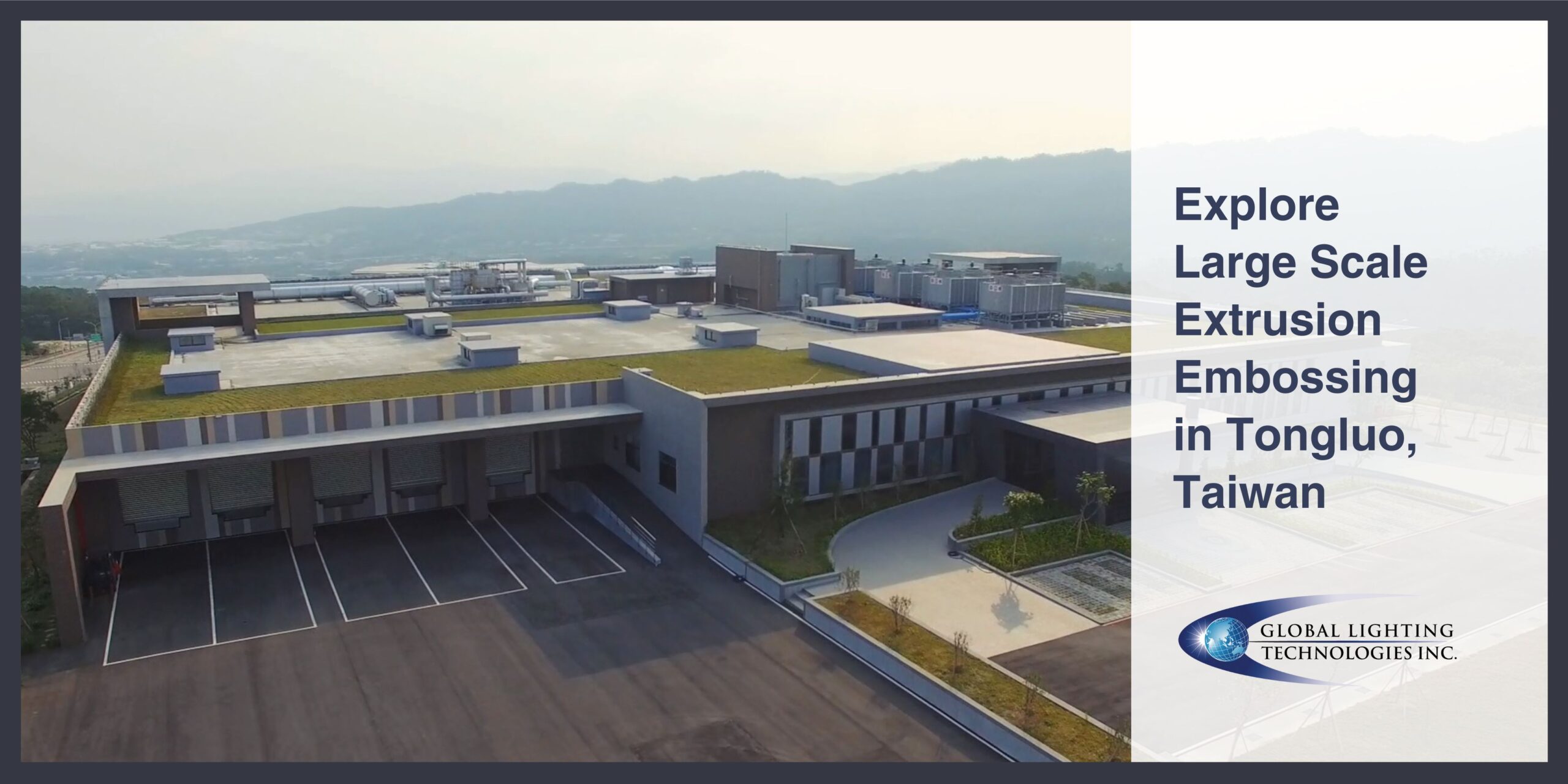 An aerial view of our Tonluo, Taiwan production facility surrounded by mountains and trees.